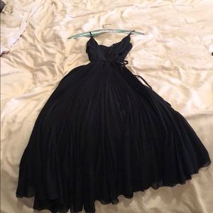 Aritzia black wrap dress. Never worn